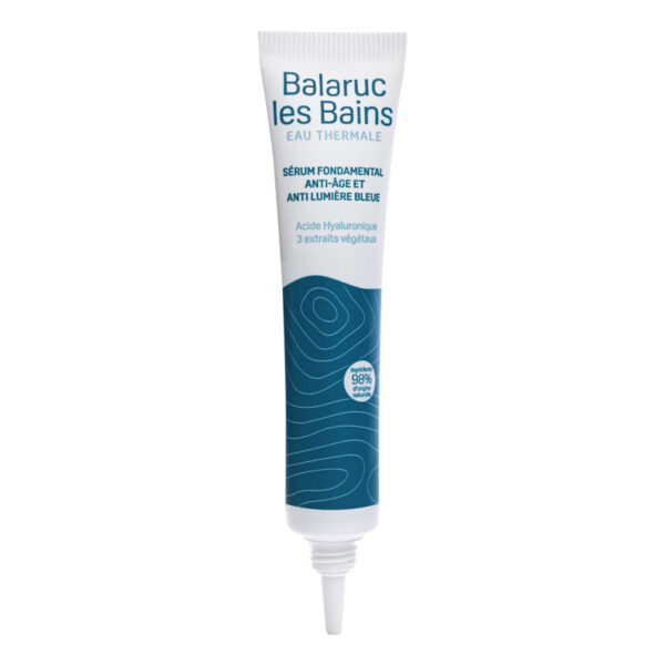 Tube canule de 20ml sur fond blanc présentant le sérum fondamental anti âge anti lumière bleue à l'acide